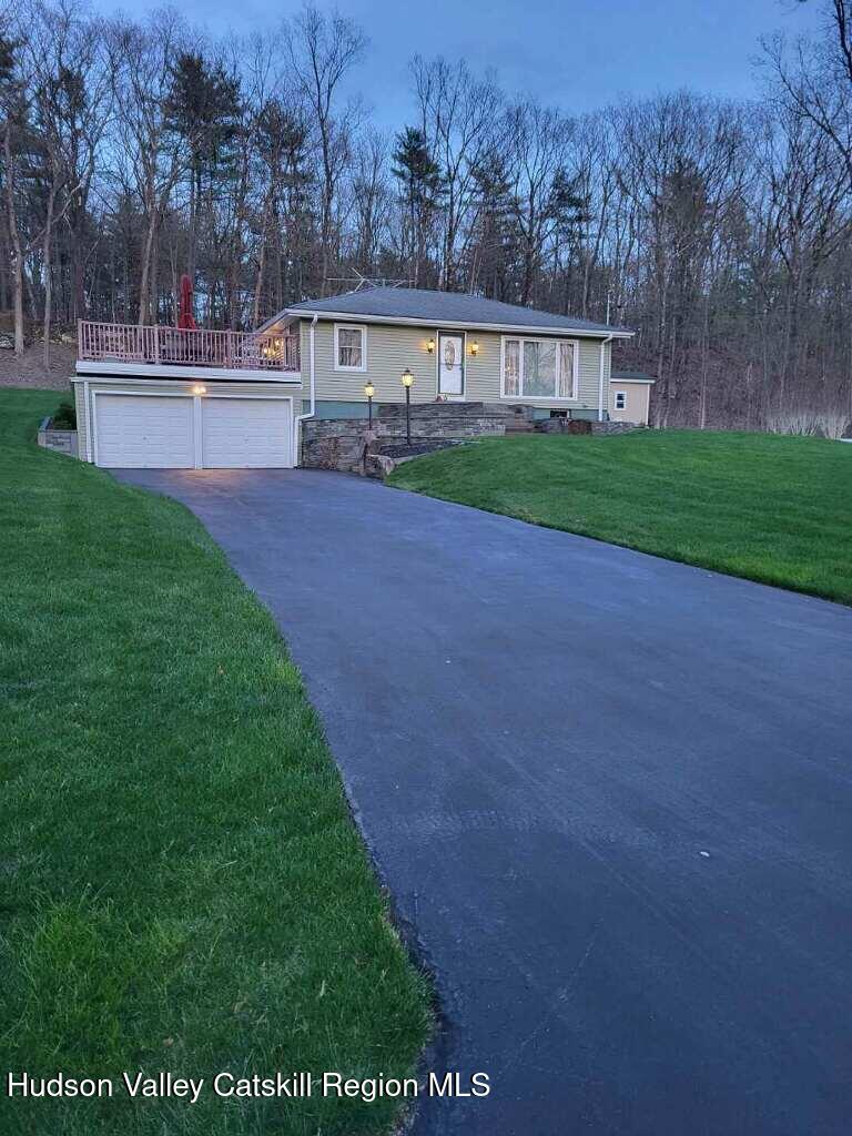 412 Vosenkill Road Athens, NY 12015 - Photo 41 of 43 a view of house with outdoor space and garden