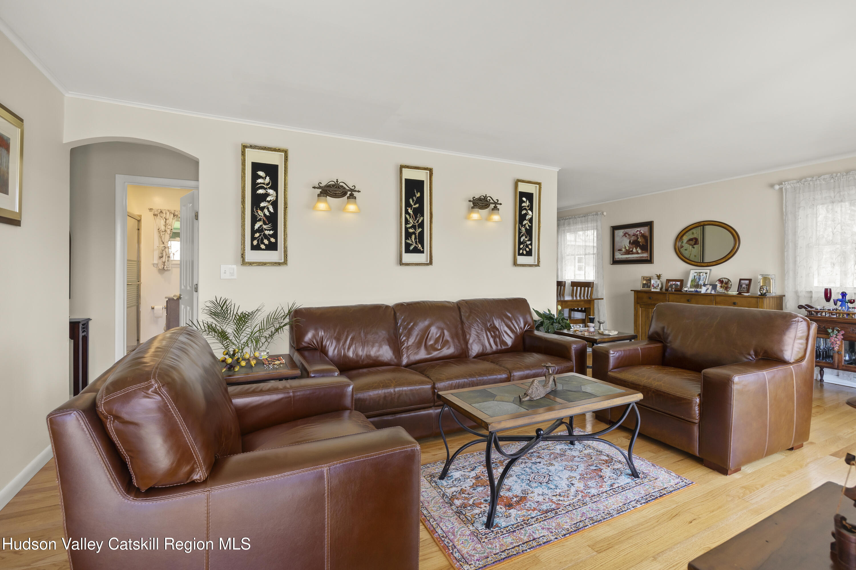 412 Vosenkill Road Athens, NY 12015 - Photo 5 of 43 a living room with furniture a rug and a window