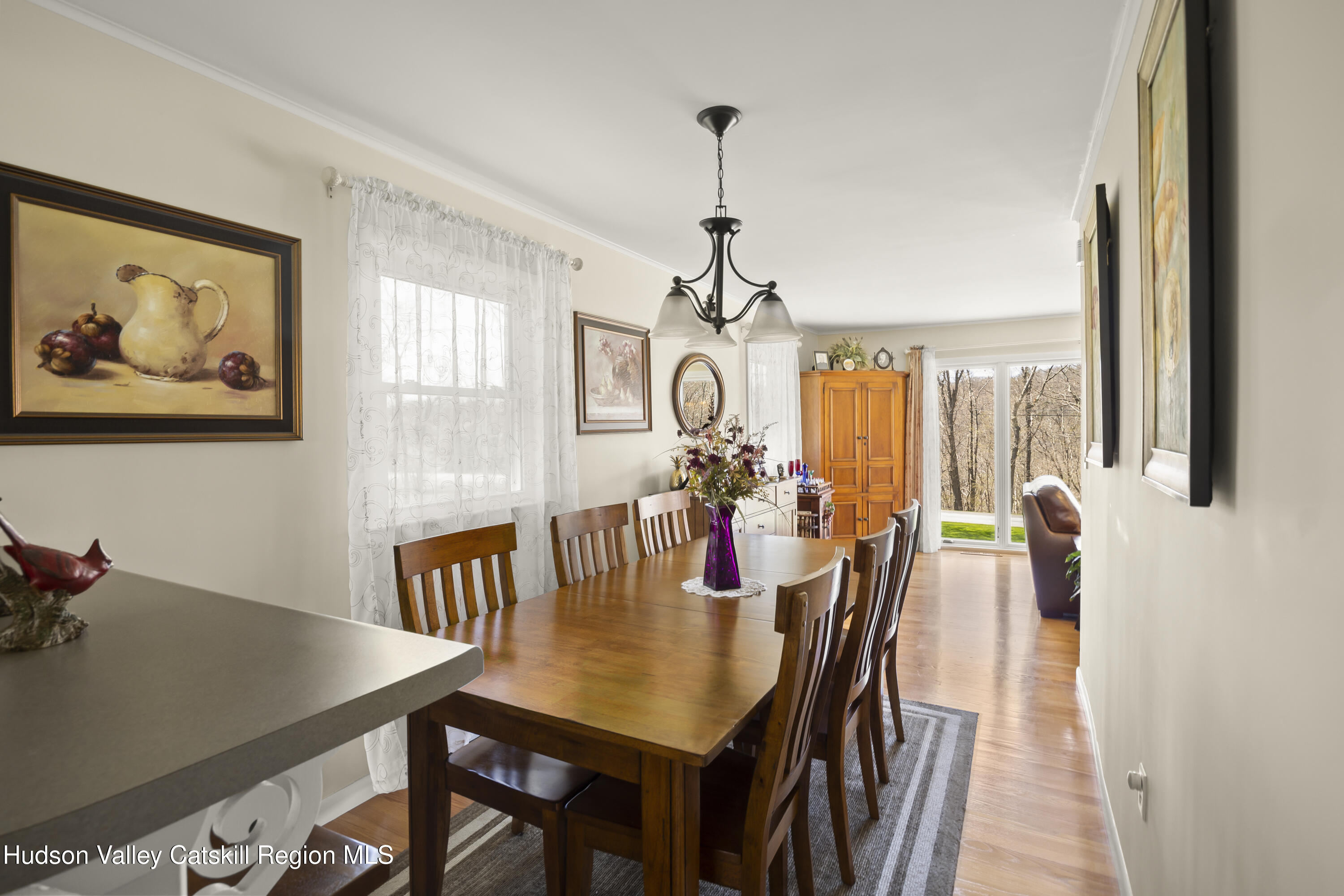 412 Vosenkill Road Athens, NY 12015 - Photo 6 of 43 a view of a dining room with furniture window and wooden floor