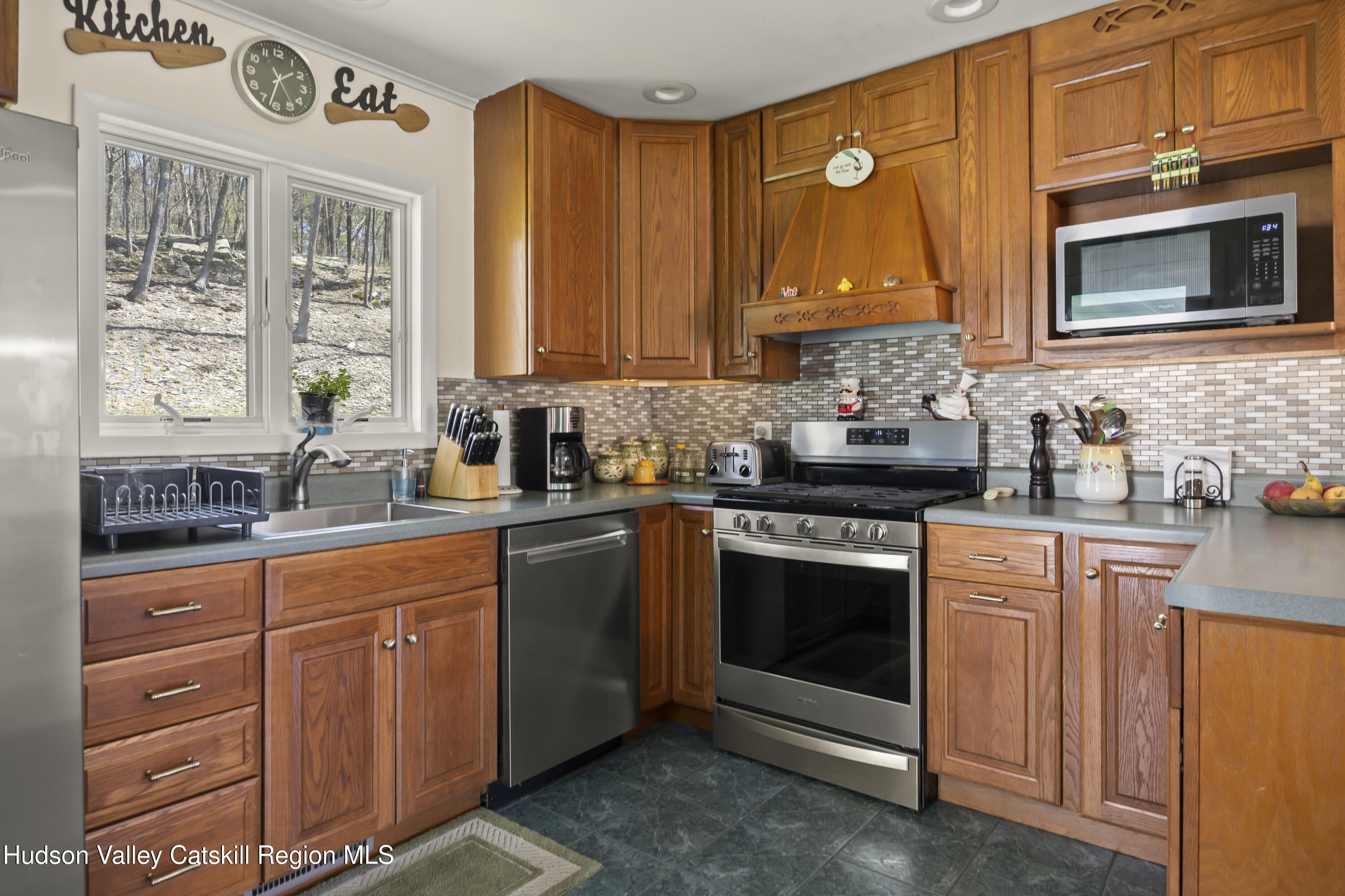 412 Vosenkill Road Athens, NY 12015 - Photo 9 of 43 a kitchen with stainless steel appliances granite countertop a stove a sink and a microwave