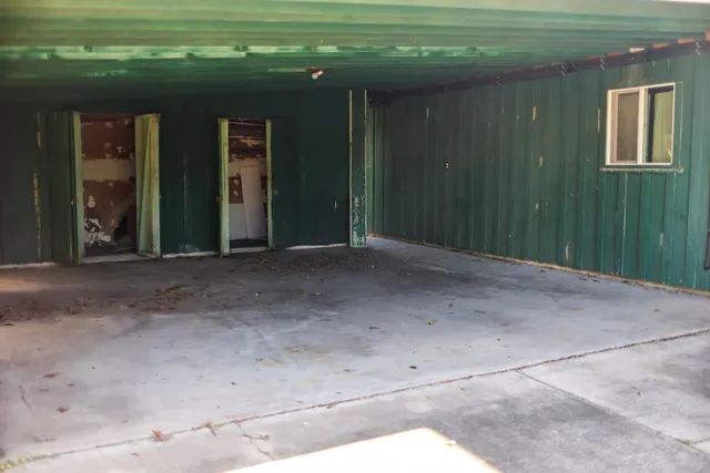 a view of a backyard of a house