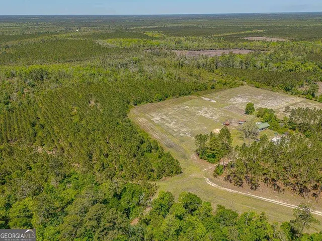 a view of lake with green space