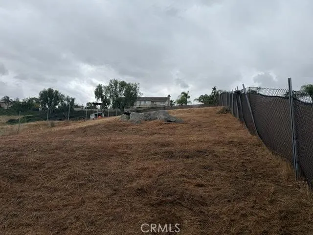 0 Runner Ridge Riverside, CA 92505 - Photo 2 of 3 a view of a dry yard with wooden fence