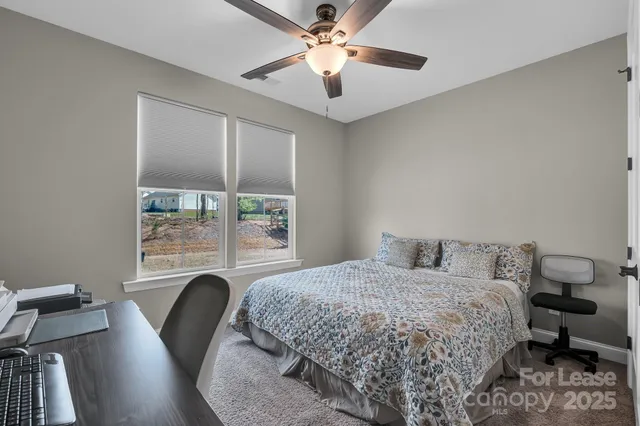 a bedroom with a bed and a closet