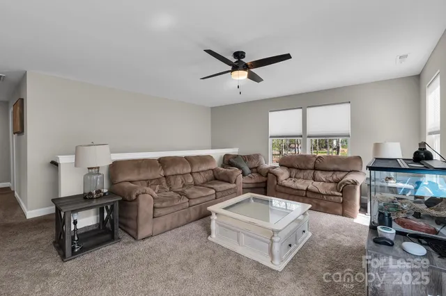 a bathroom with a sink a mirror and vanity