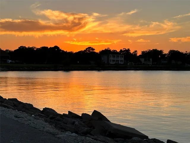 a view of ocean with mountain