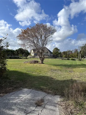 a view of a golf course with a lake