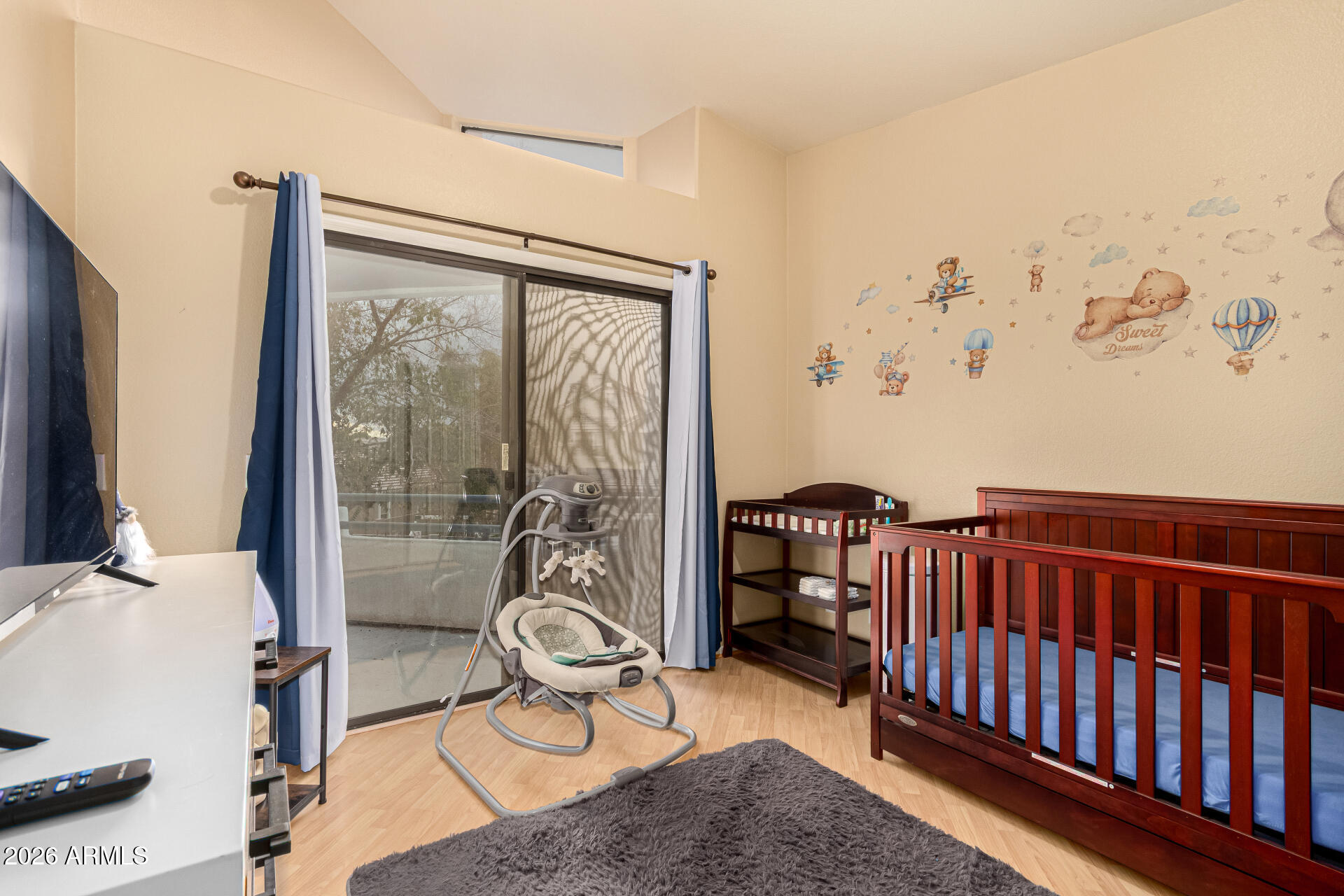 1800 West Elliot Road, Unit 227 Chandler, AZ 85224 - Photo 14 of 27 a bedroom with furniture and a window