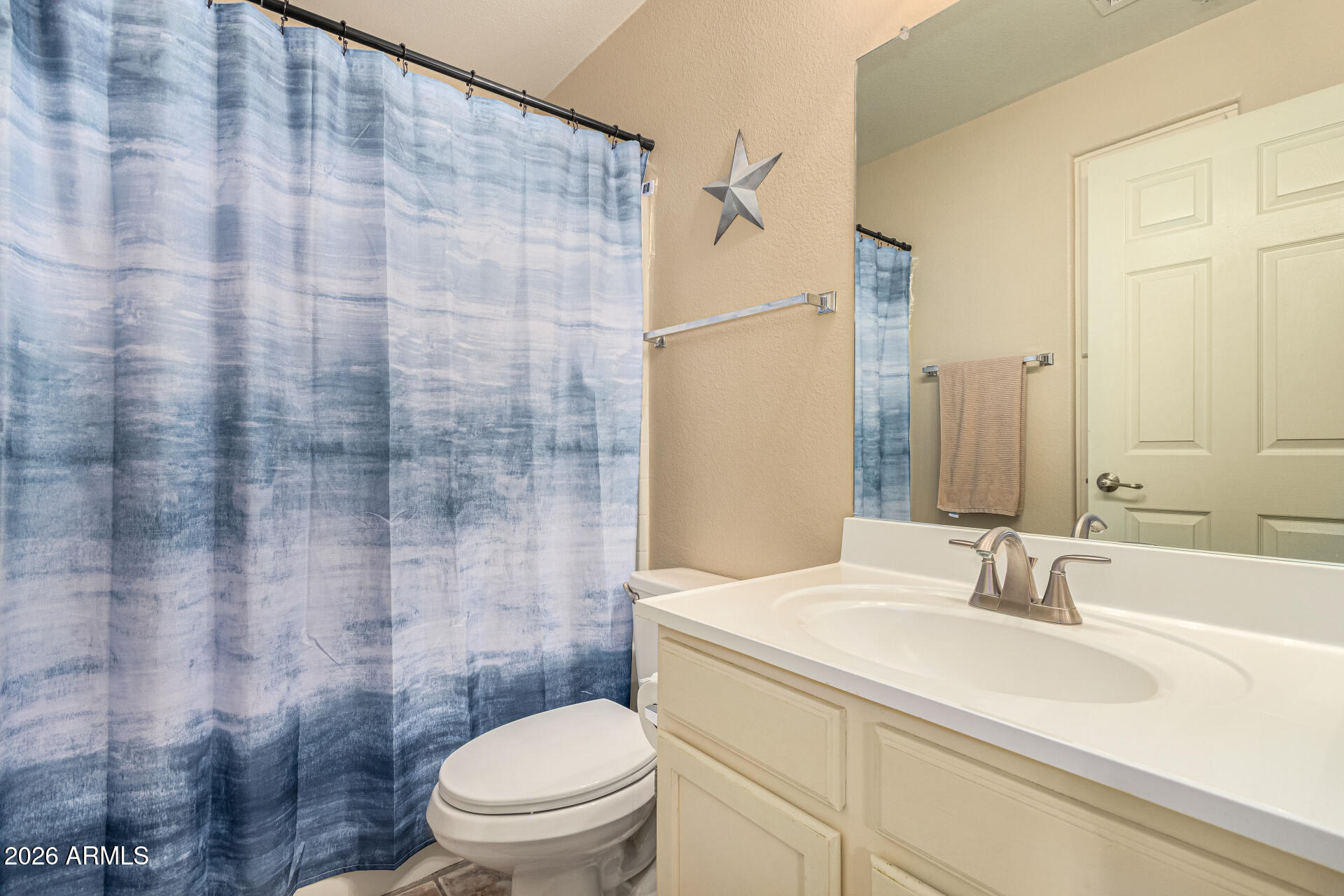 1800 West Elliot Road, Unit 227 Chandler, AZ 85224 - Photo 15 of 27 a bathroom with a sink toilet and shower