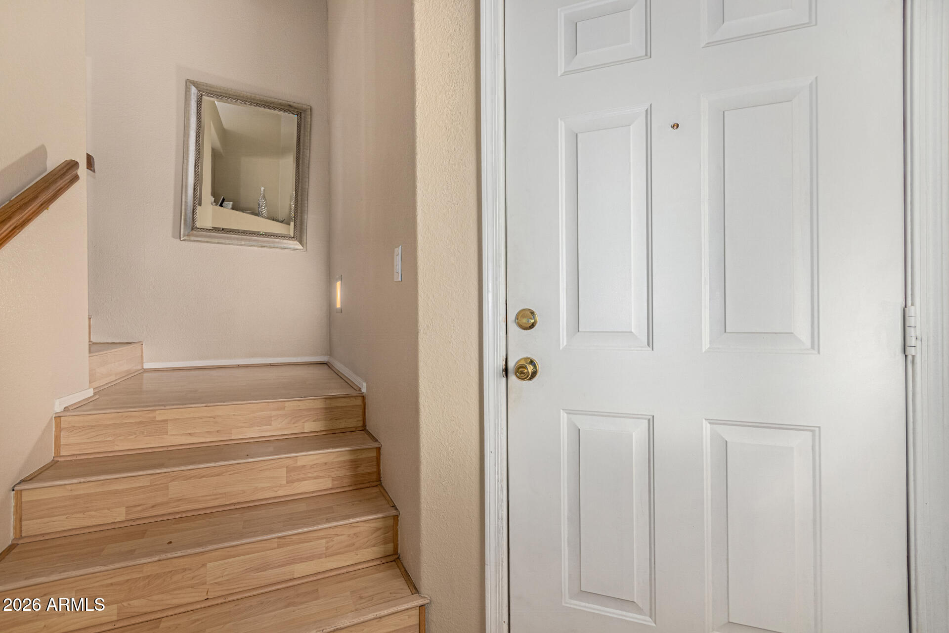 1800 West Elliot Road, Unit 227 Chandler, AZ 85224 - Photo 19 of 27 a view of a hallway with wooden floor and entryway