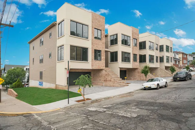 a large building with a small yard