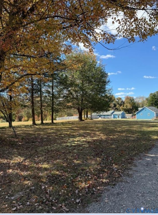 1151 Cartersville Road Cartersville, VA 23027 - Photo 2 of 14 a big yard with lots of green space