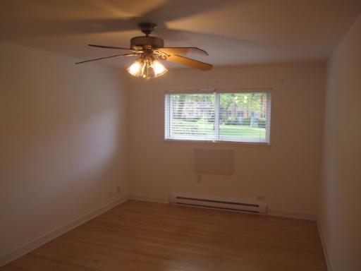 834 East Old Willow Road, Unit 109 Prospect Heights, IL 60070 - Photo 8 of 10 an empty room with a window