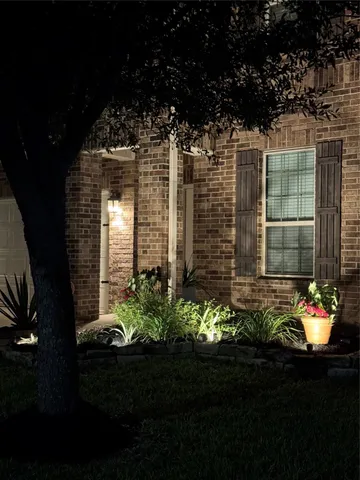 a view of a house with a garden