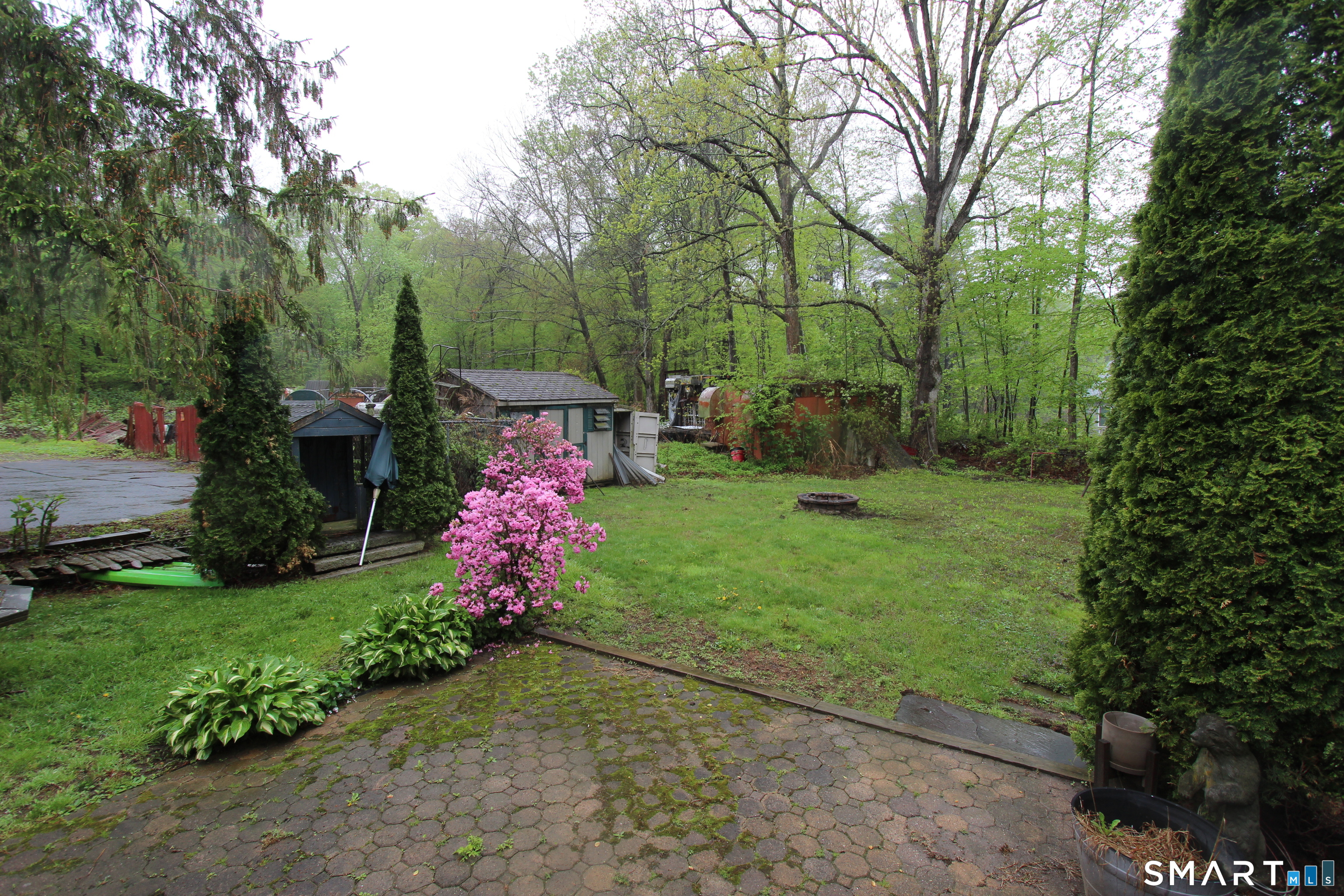 22 Brook Street Seymour, CT 06483 - Photo 3 of 13 a garden view with swimming pool and garden