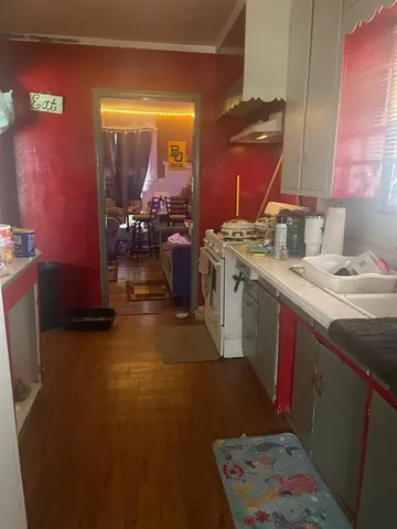 a bathroom with a sink a vanity and a mirror