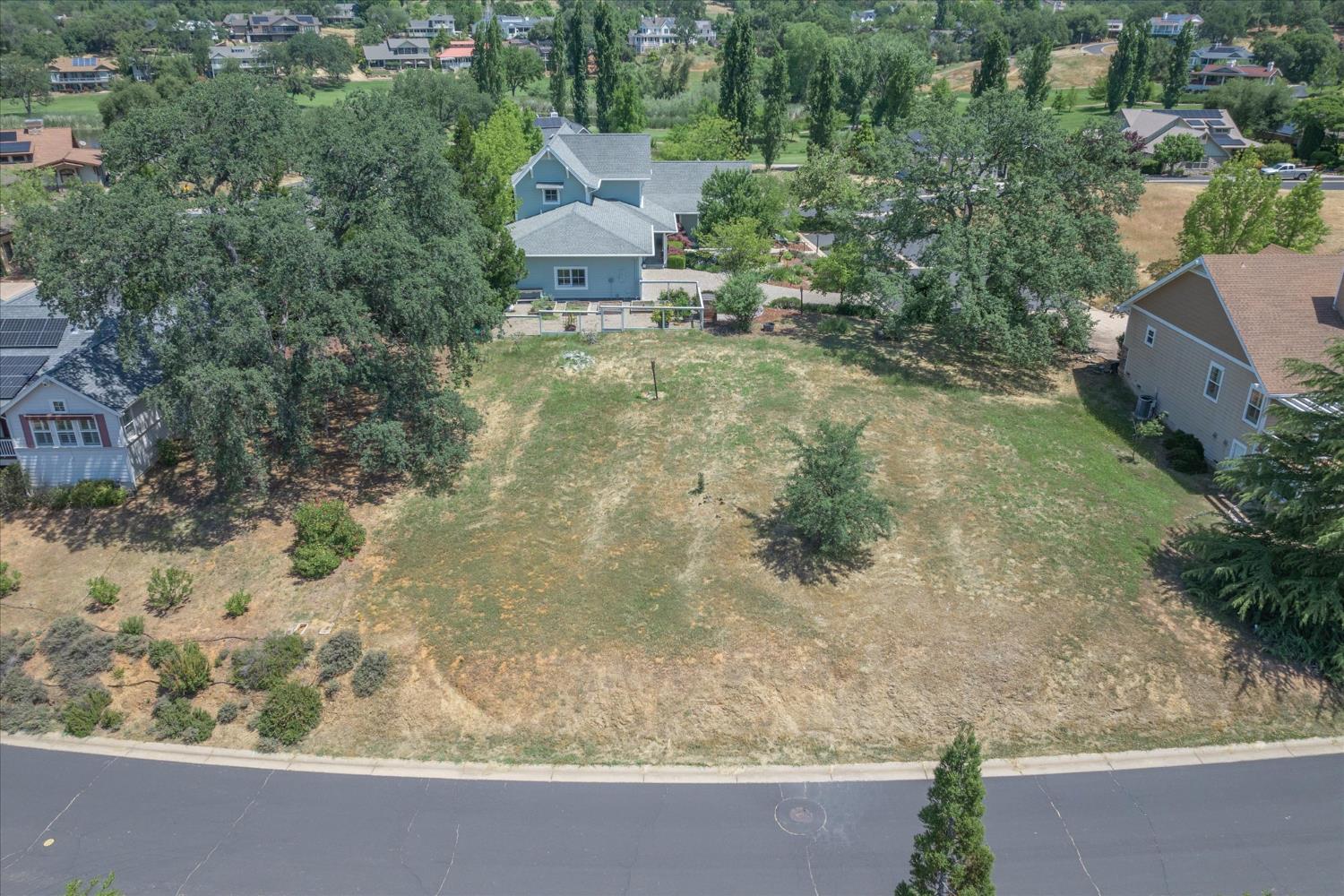 0 Alawa Place Angels Camp, CA 95222 - Photo 4 of 10 an aerial view of a house with a yard and large trees