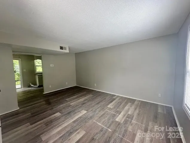 a view of an empty room and window
