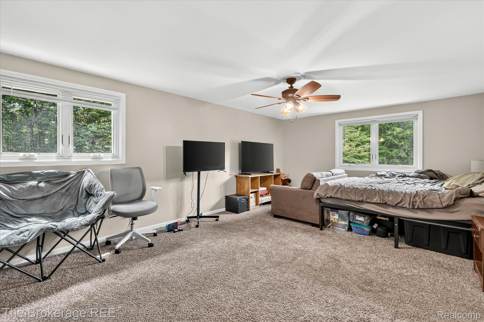 13269 North Genesee Road Clio, MI 48420 - Photo 30 of 67 Carpeted room featuring light-colored walls and white trim windows