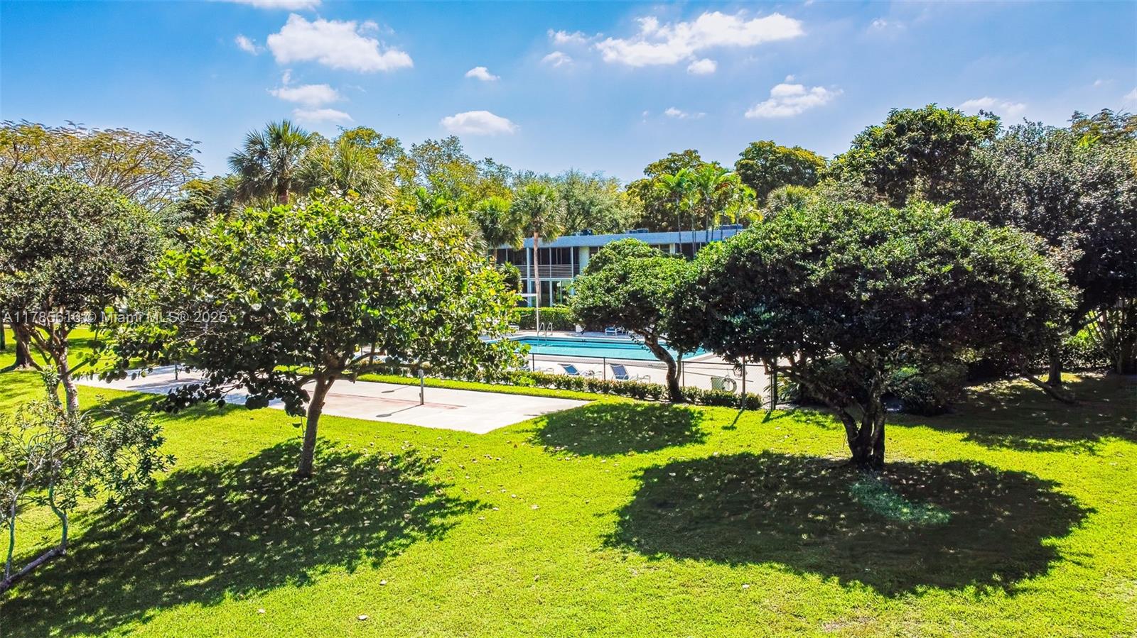 4221 West Palm Aire Drive, Unit 203 Pompano Beach, FL 33069 - Photo 19 of 39 a view of an outdoor space with a lake view