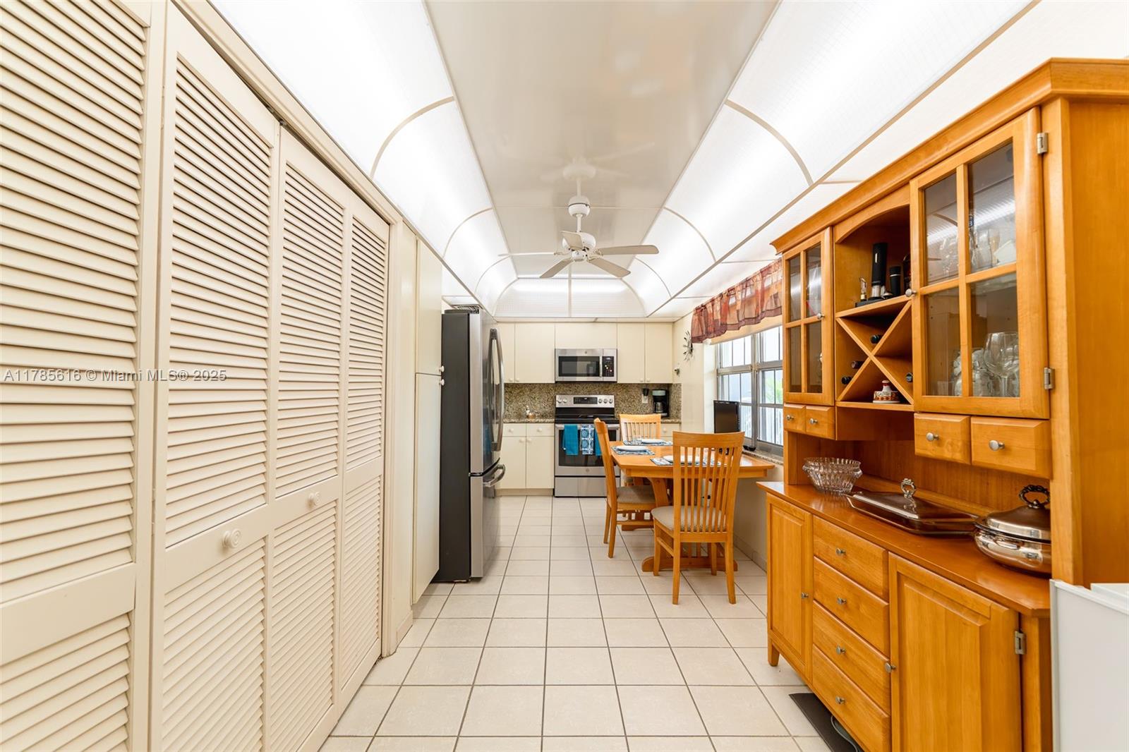 4221 West Palm Aire Drive, Unit 203 Pompano Beach, FL 33069 - Photo 20 of 39 a view of a terrace with chairs