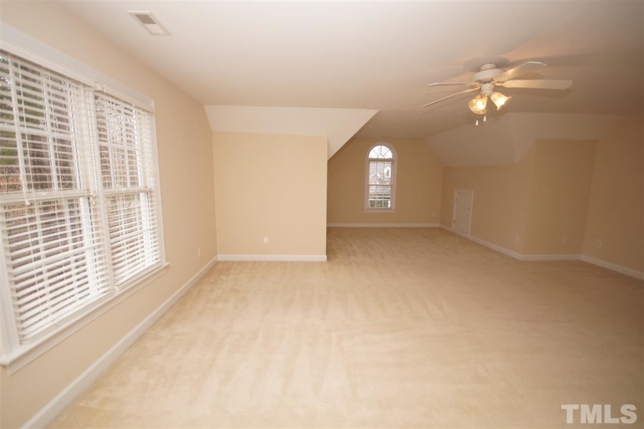 12736 Amoretto Way Raleigh, NC 27613 - Photo 18 of 25 a view of empty room with window
