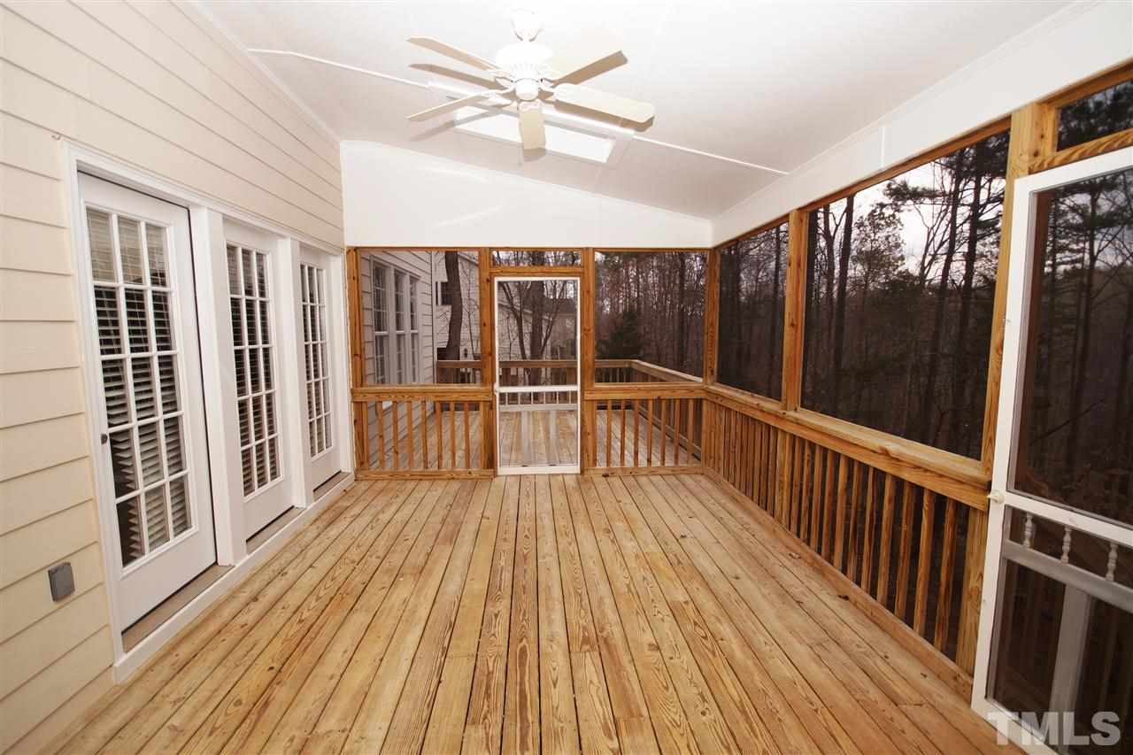 12736 Amoretto Way Raleigh, NC 27613 - Photo 23 of 25 a view of a balcony with wooden floor