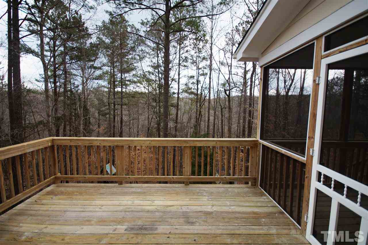 12736 Amoretto Way Raleigh, NC 27613 - Photo 24 of 25 a view of balcony with wooden floor
