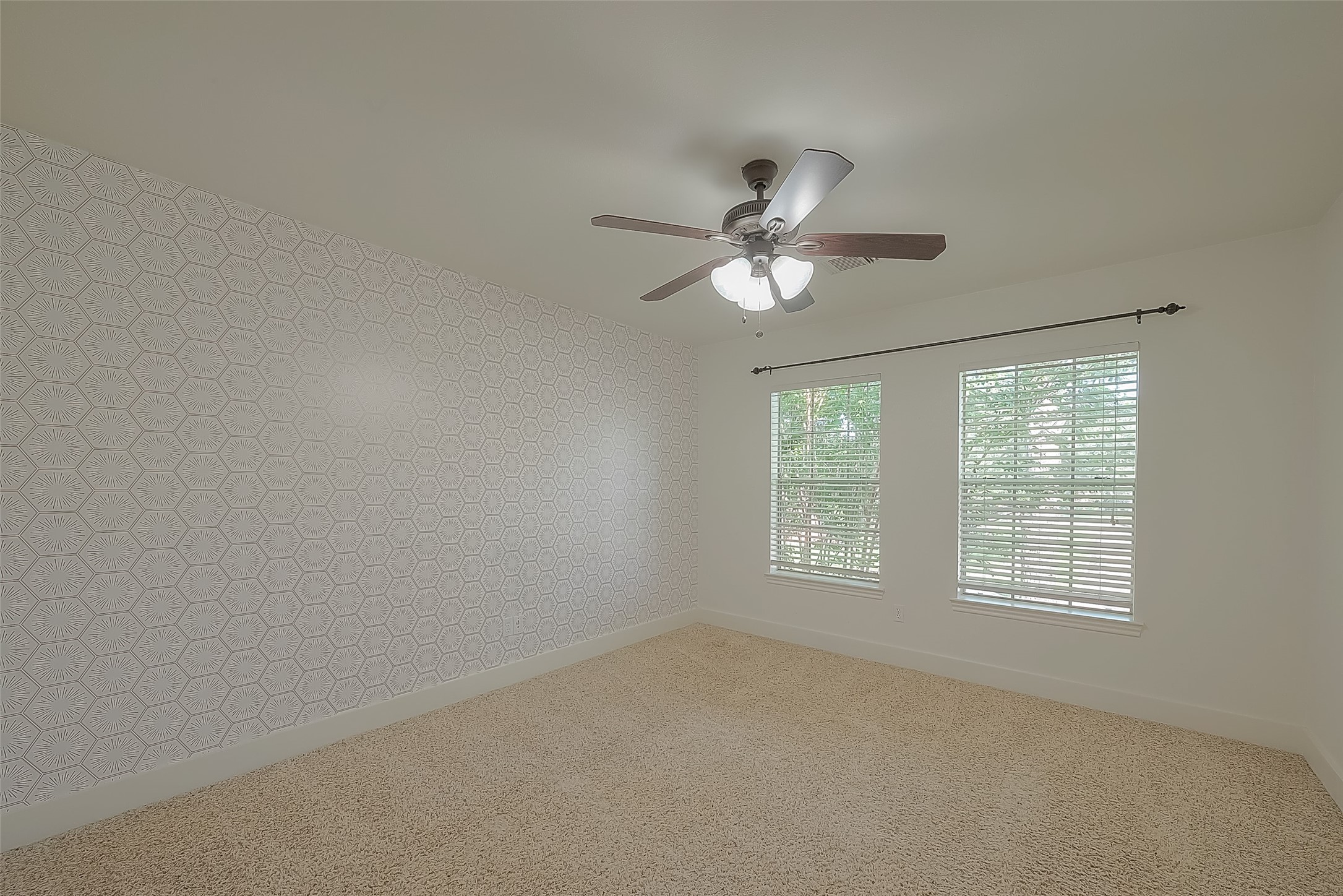 8910 Bonnyview Drive Houston, TX 77095 - Photo 22 of 31 an empty room with a window