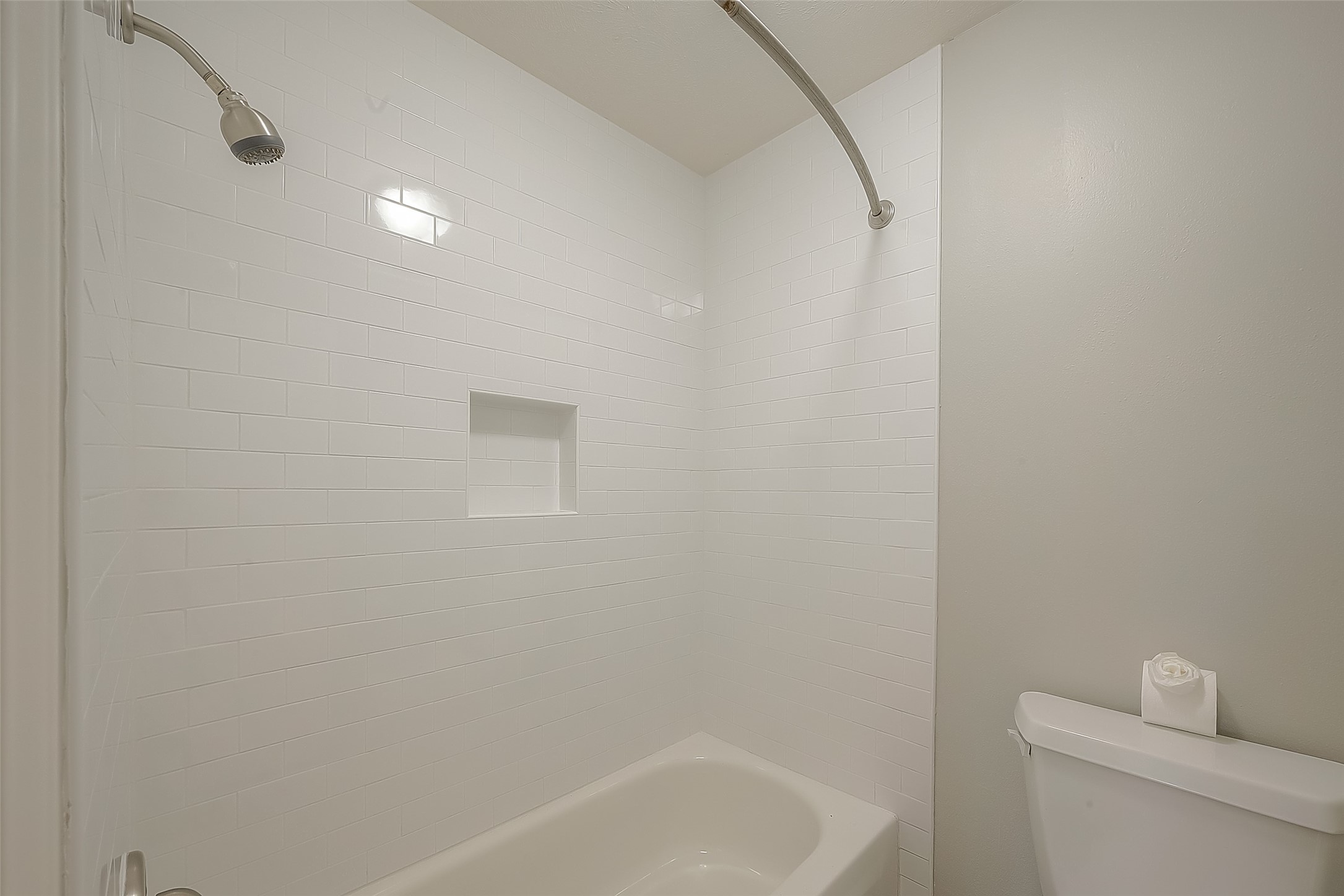 8910 Bonnyview Drive Houston, TX 77095 - Photo 26 of 31 a bathroom with a bathtub and a toilet