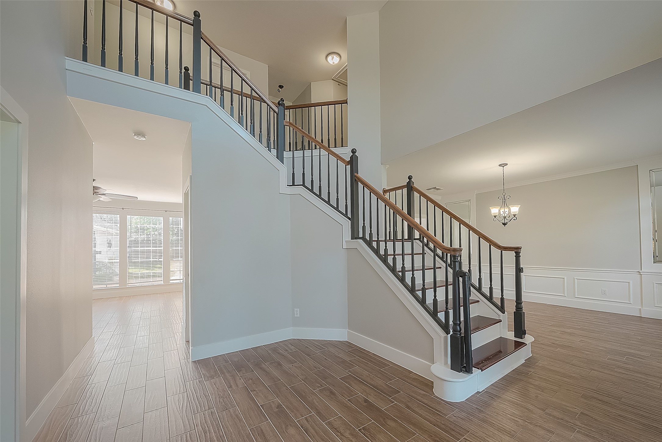 8910 Bonnyview Drive Houston, TX 77095 - Photo 4 of 31 a view of entryway with wooden floor