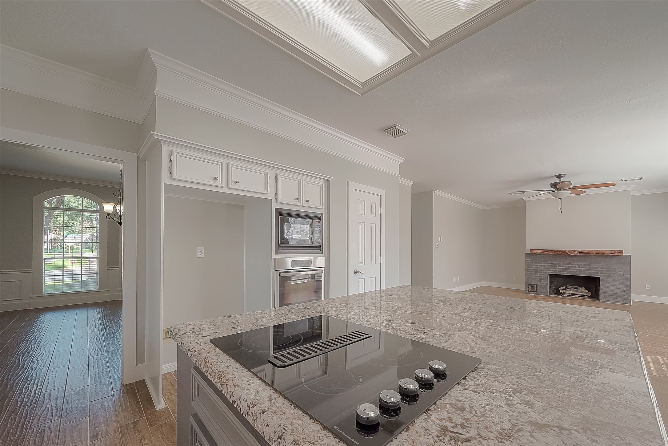 8910 Bonnyview Drive Houston, TX 77095 - Photo 9 of 31 a living room with furniture and a fireplace
