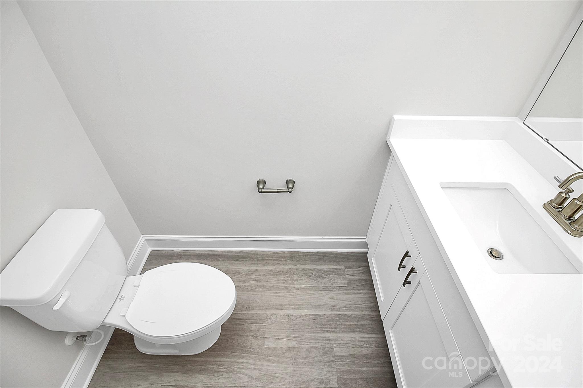 1418 Azalea Avenue Kannapolis, NC 28081 - Photo 12 of 39 a bathroom with a sink and a mirror