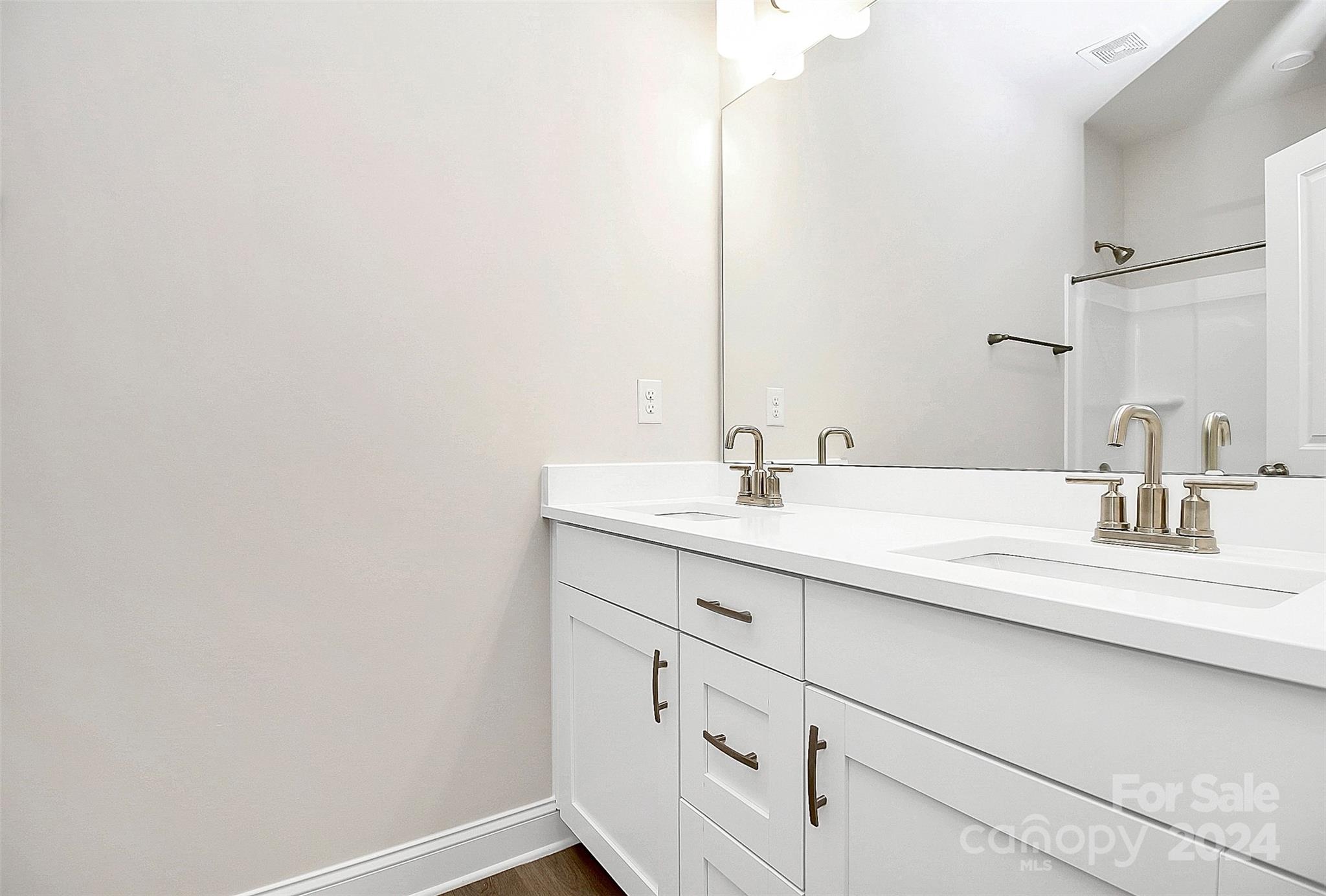 1418 Azalea Avenue Kannapolis, NC 28081 - Photo 13 of 39 a bathroom with a sink and a mirror