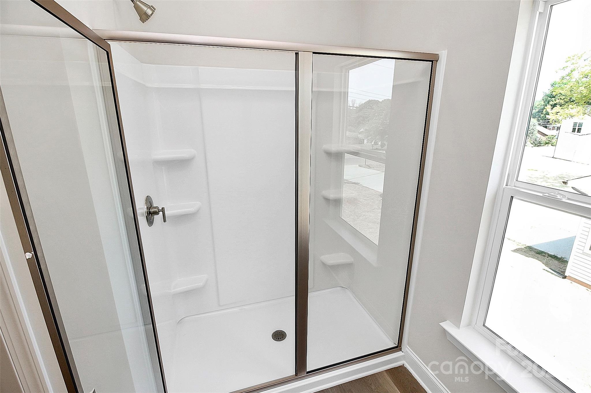 1418 Azalea Avenue Kannapolis, NC 28081 - Photo 18 of 39 a bathroom with a glass door and a glass door