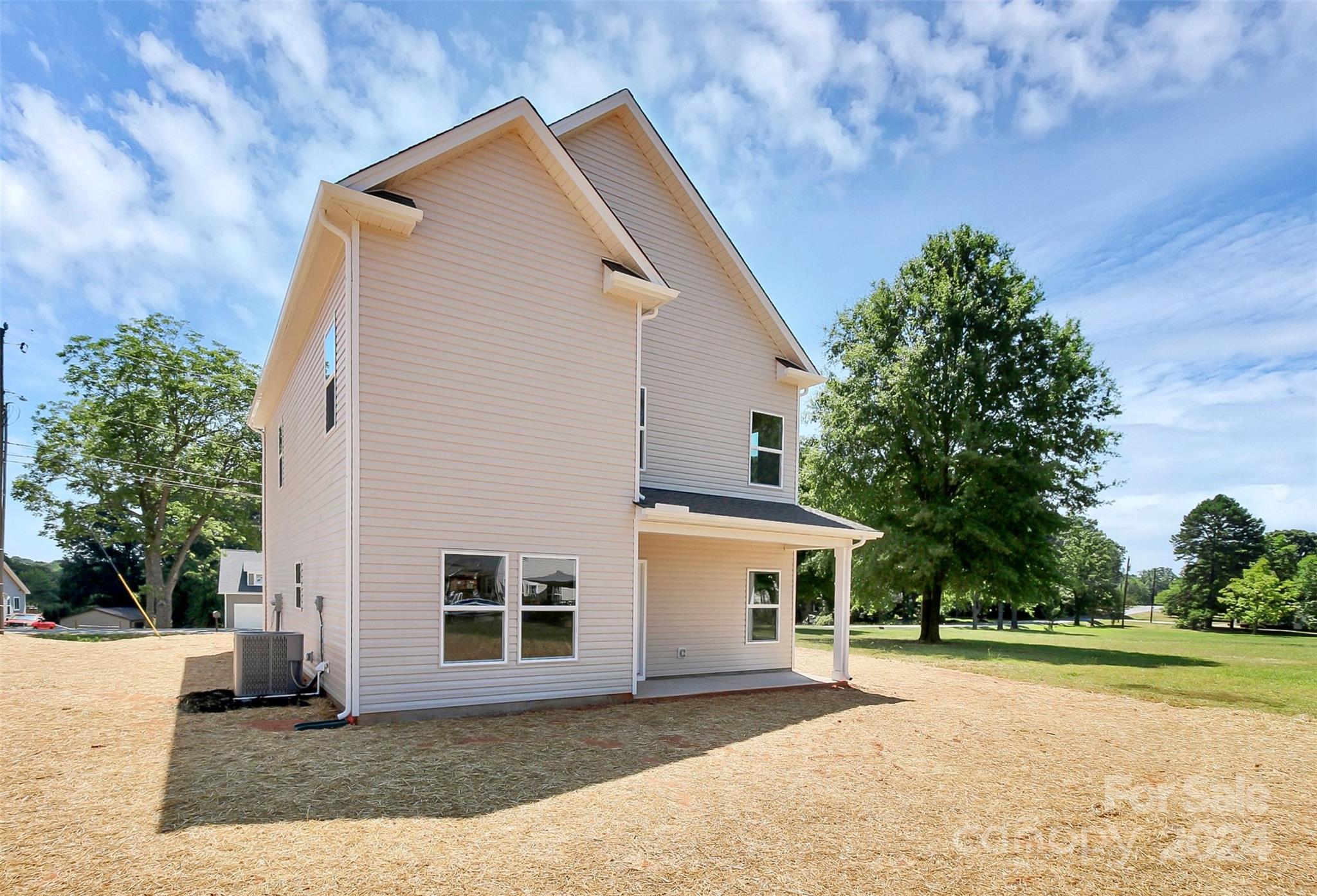 1418 Azalea Avenue Kannapolis, NC 28081 - Photo 29 of 39 a front view of a house with a yard and garage