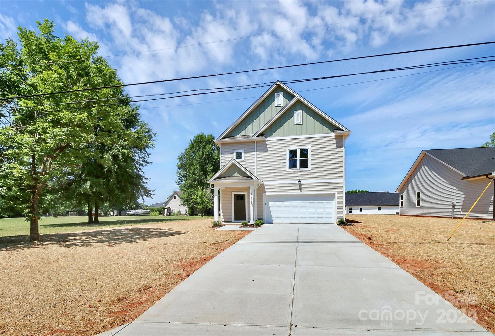 1418 Azalea Avenue Kannapolis, NC 28081 - Photo 31 of 39 a front view of a house with a yard