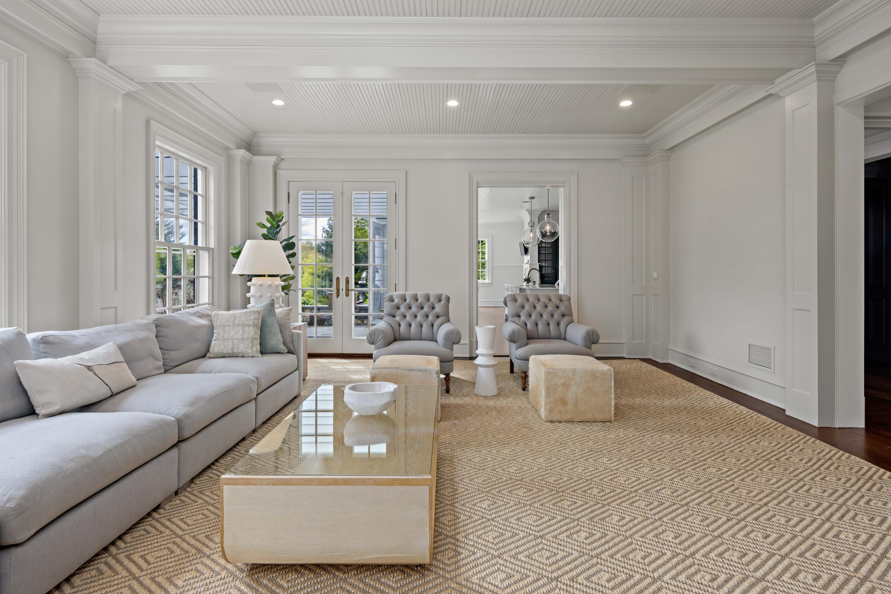 625 Oenoke Ridge New Canaan, CT 06840 - Photo 18 of 40 a living room with furniture and wooden floor