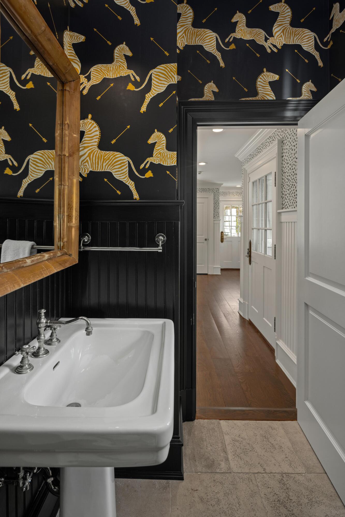 625 Oenoke Ridge New Canaan, CT 06840 - Photo 23 of 40 a bathroom with a sink and a mirror