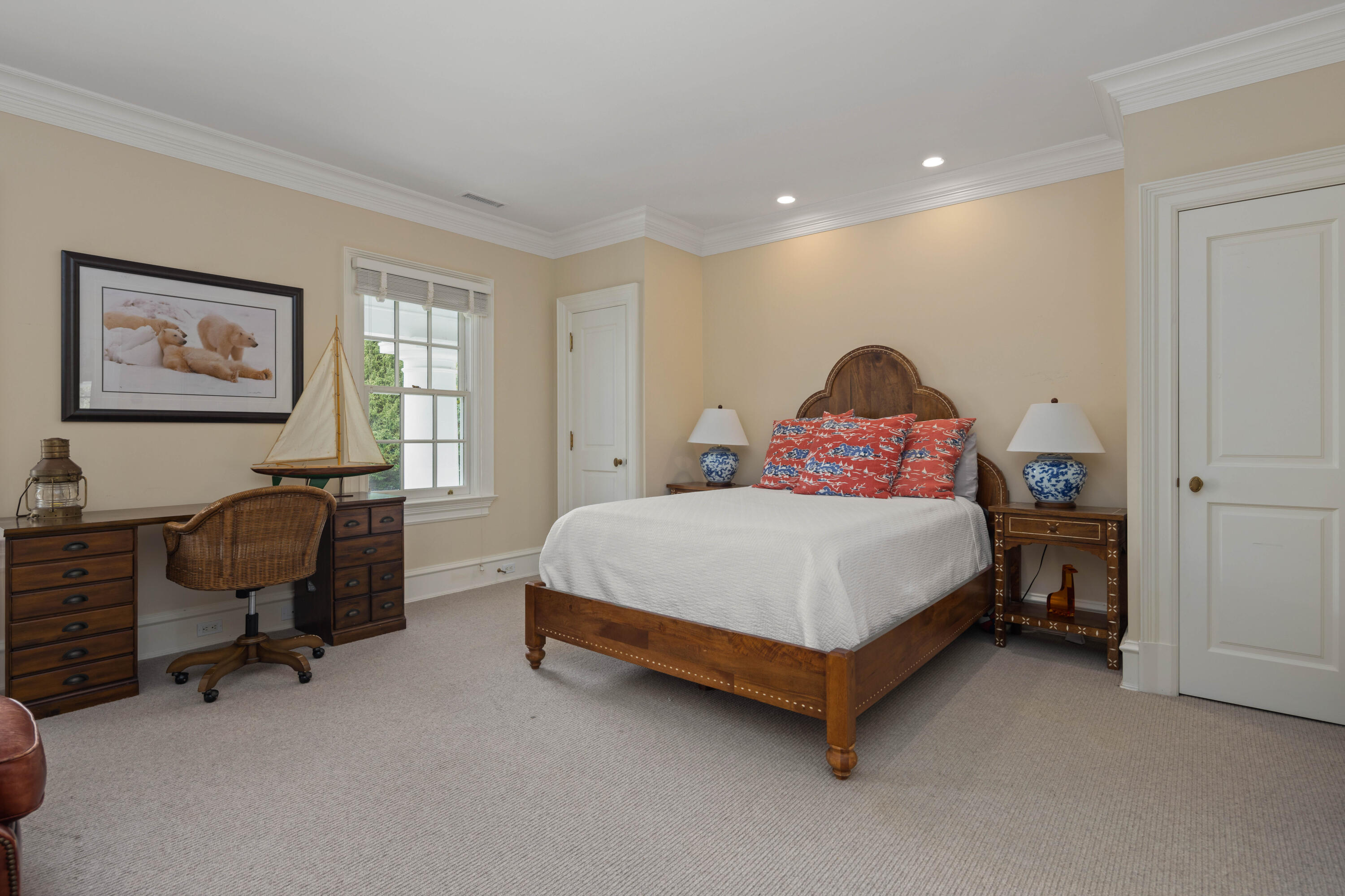 625 Oenoke Ridge New Canaan, CT 06840 - Photo 28 of 40 a bed room with a bed and a chair