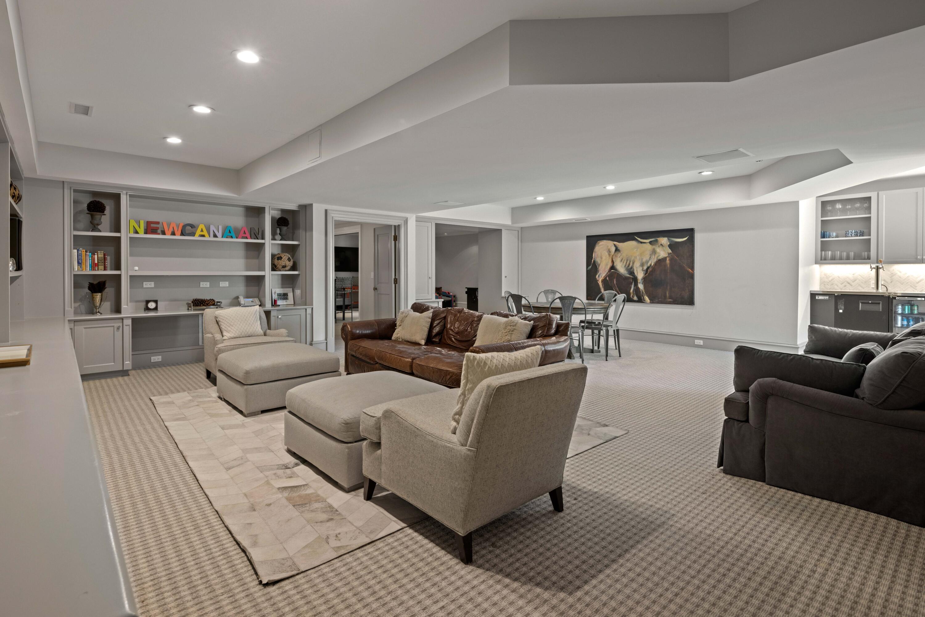 625 Oenoke Ridge New Canaan, CT 06840 - Photo 29 of 40 a living room with furniture and a wooden floor