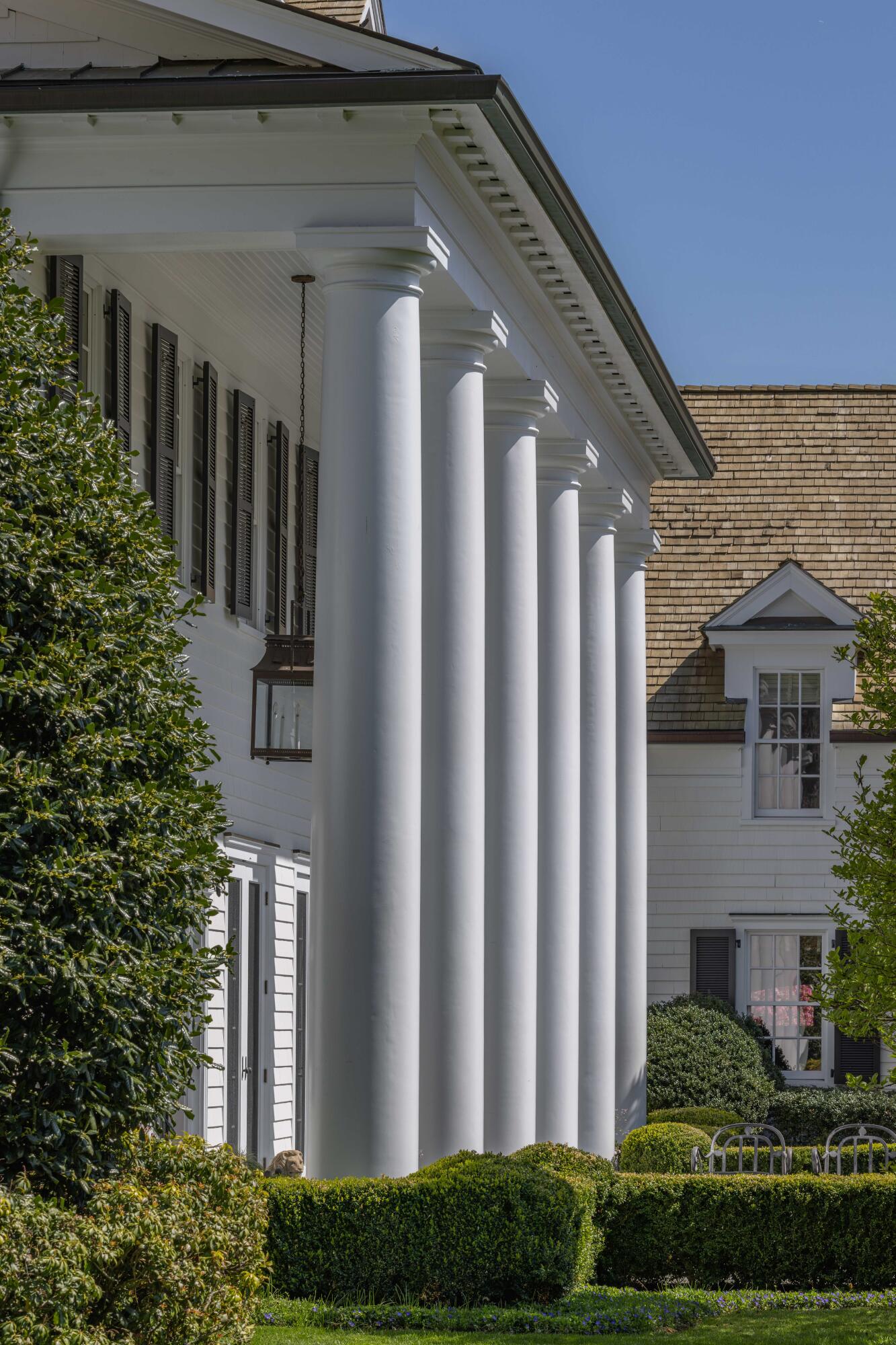 625 Oenoke Ridge New Canaan, CT 06840 - Photo 4 of 40 a front view of a house with stairs