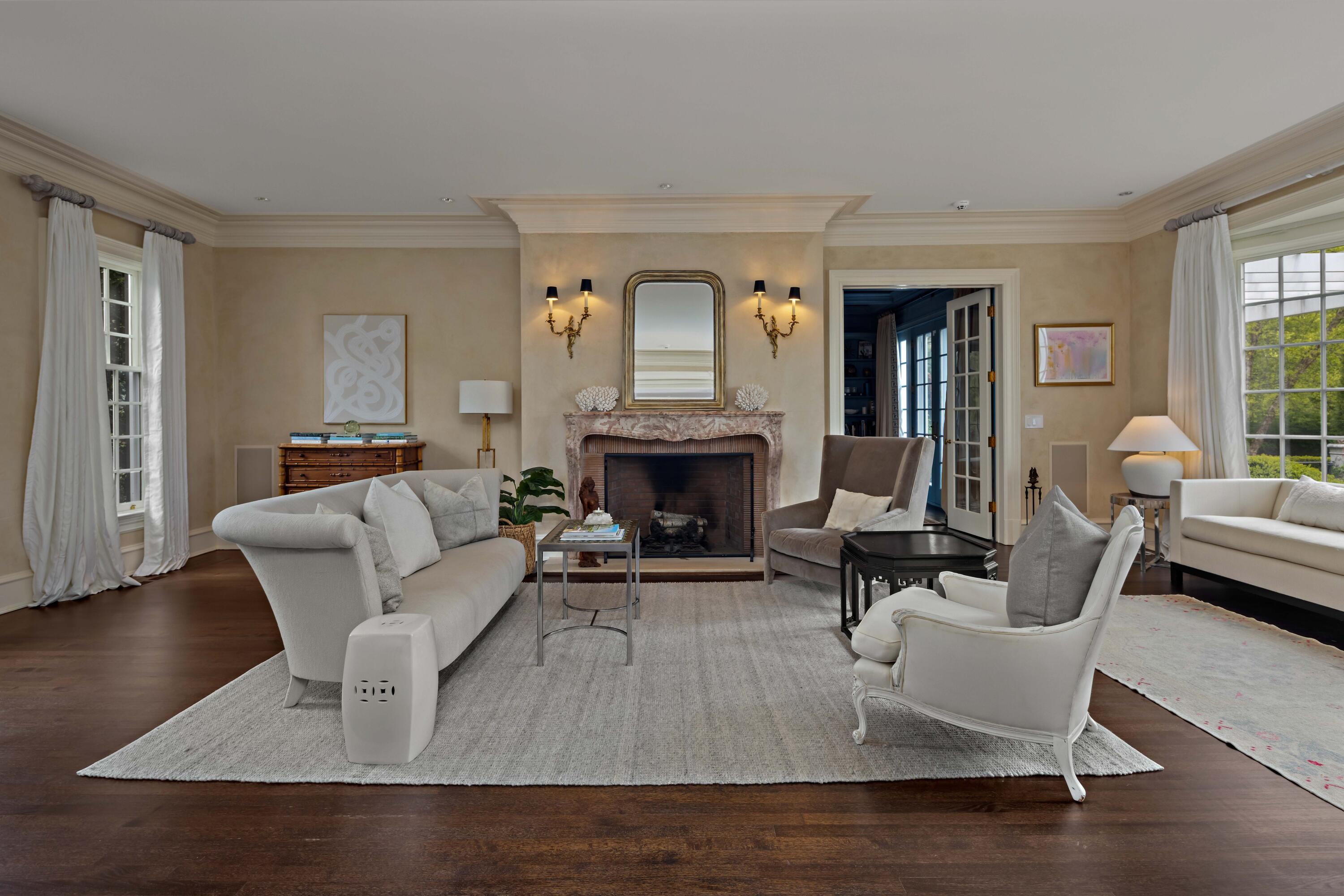 625 Oenoke Ridge New Canaan, CT 06840 - Photo 7 of 40 a living room with furniture and a fireplace