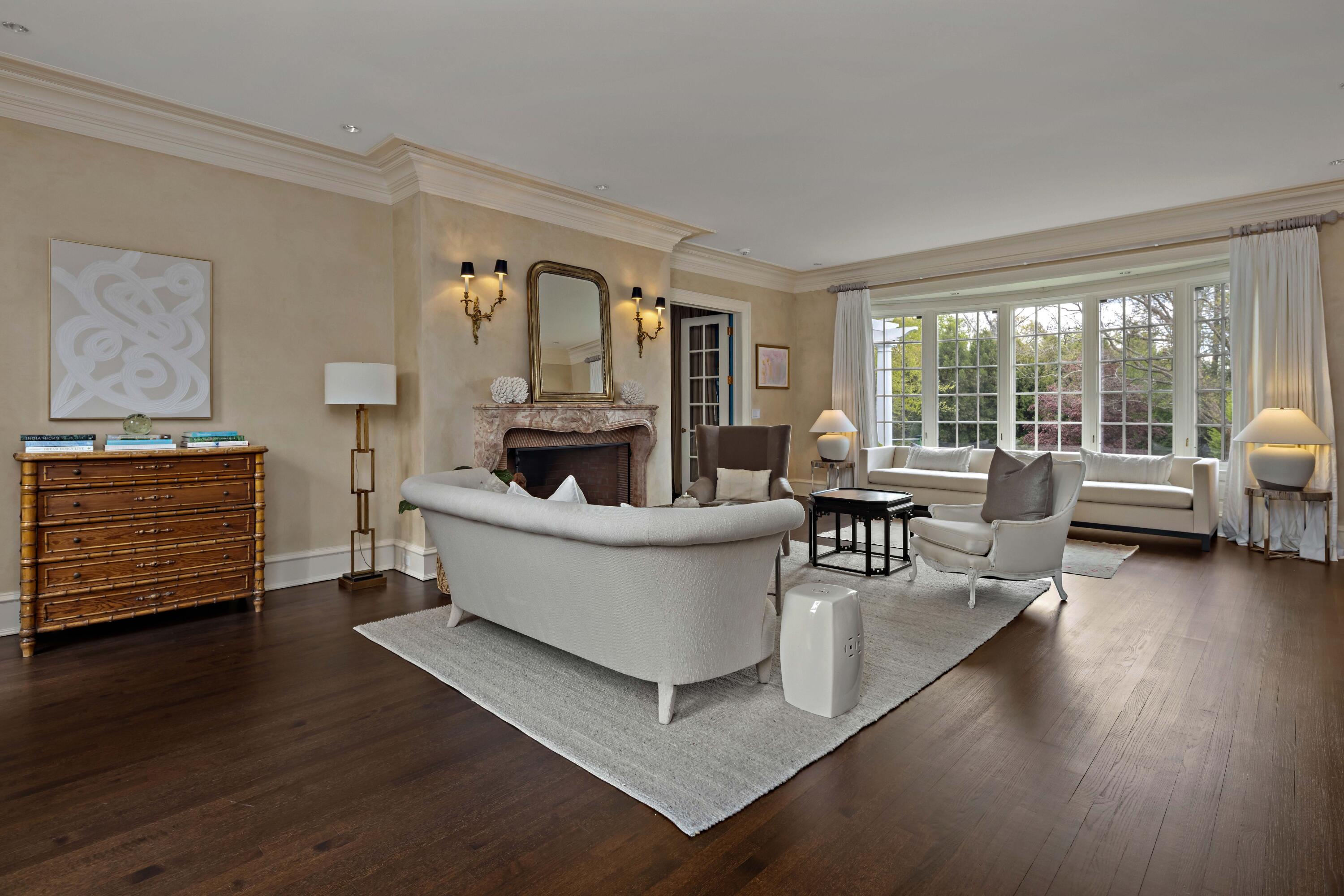 625 Oenoke Ridge New Canaan, CT 06840 - Photo 8 of 40 a living room with furniture and a large window