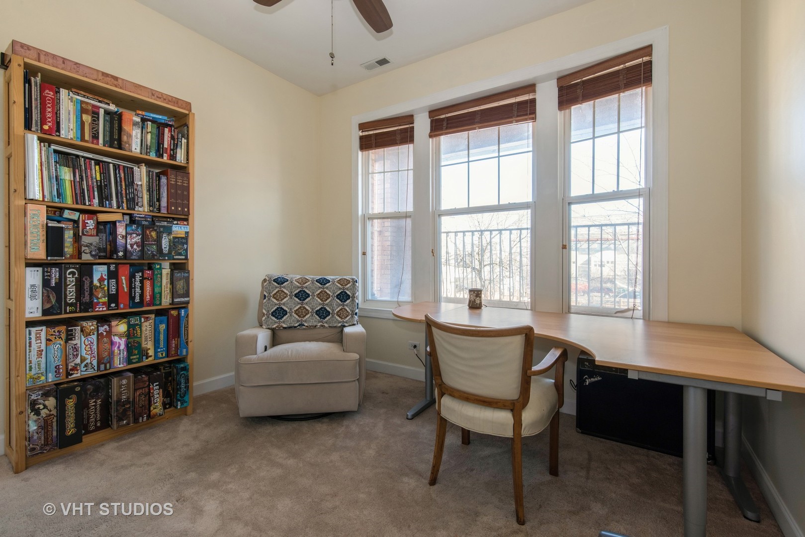 2010 North Spaulding Avenue, Unit 2 Chicago, IL 60647 - Photo 6 of 10 a living room with furniture and a book shelf