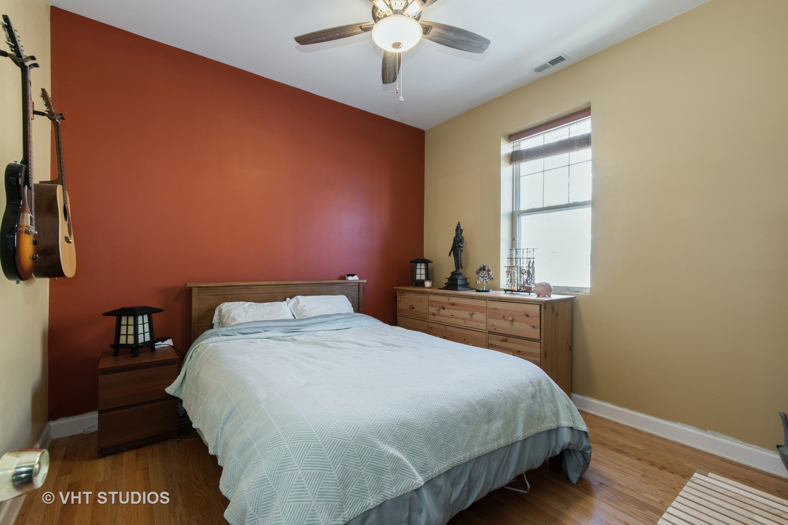 2010 North Spaulding Avenue, Unit 2 Chicago, IL 60647 - Photo 7 of 10 a bedroom with a bed and a window with bathroom