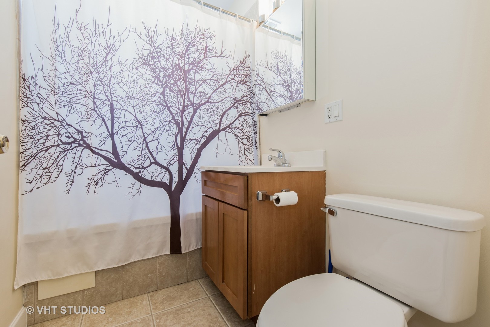 2010 North Spaulding Avenue, Unit 2 Chicago, IL 60647 - Photo 8 of 10 a bathroom with a toilet and a shower