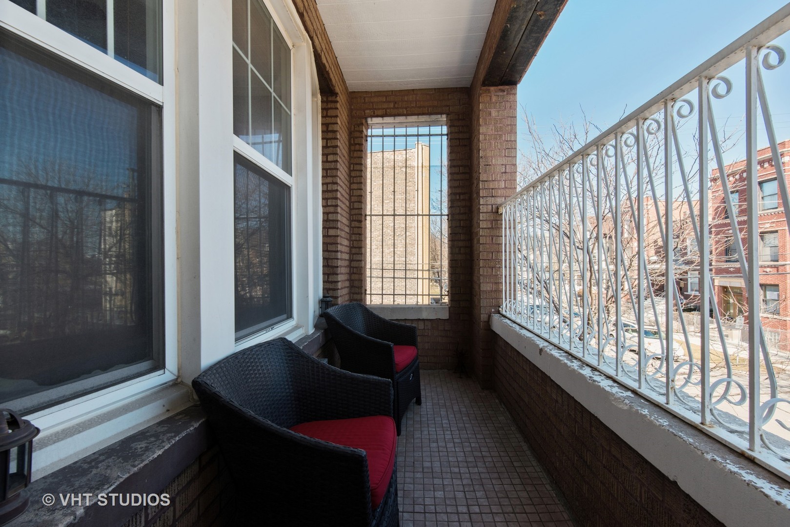 2010 North Spaulding Avenue, Unit 2 Chicago, IL 60647 - Photo 9 of 10 a living room with furniture and a large window