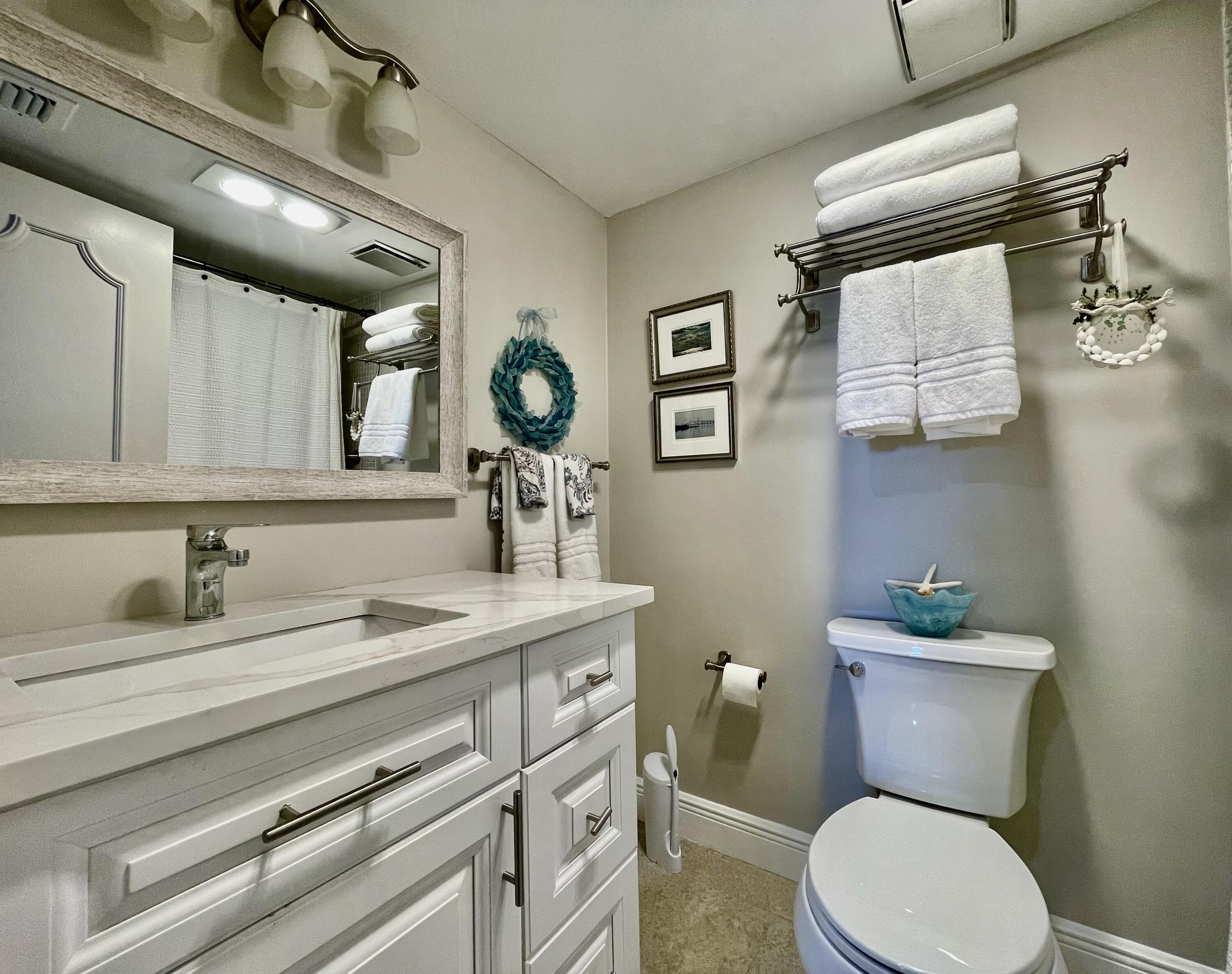 1030 Sugar Sands Boulevard, Unit 372 Riviera Beach, FL 33404 - Photo 22 of 45 Remodeled guest bath