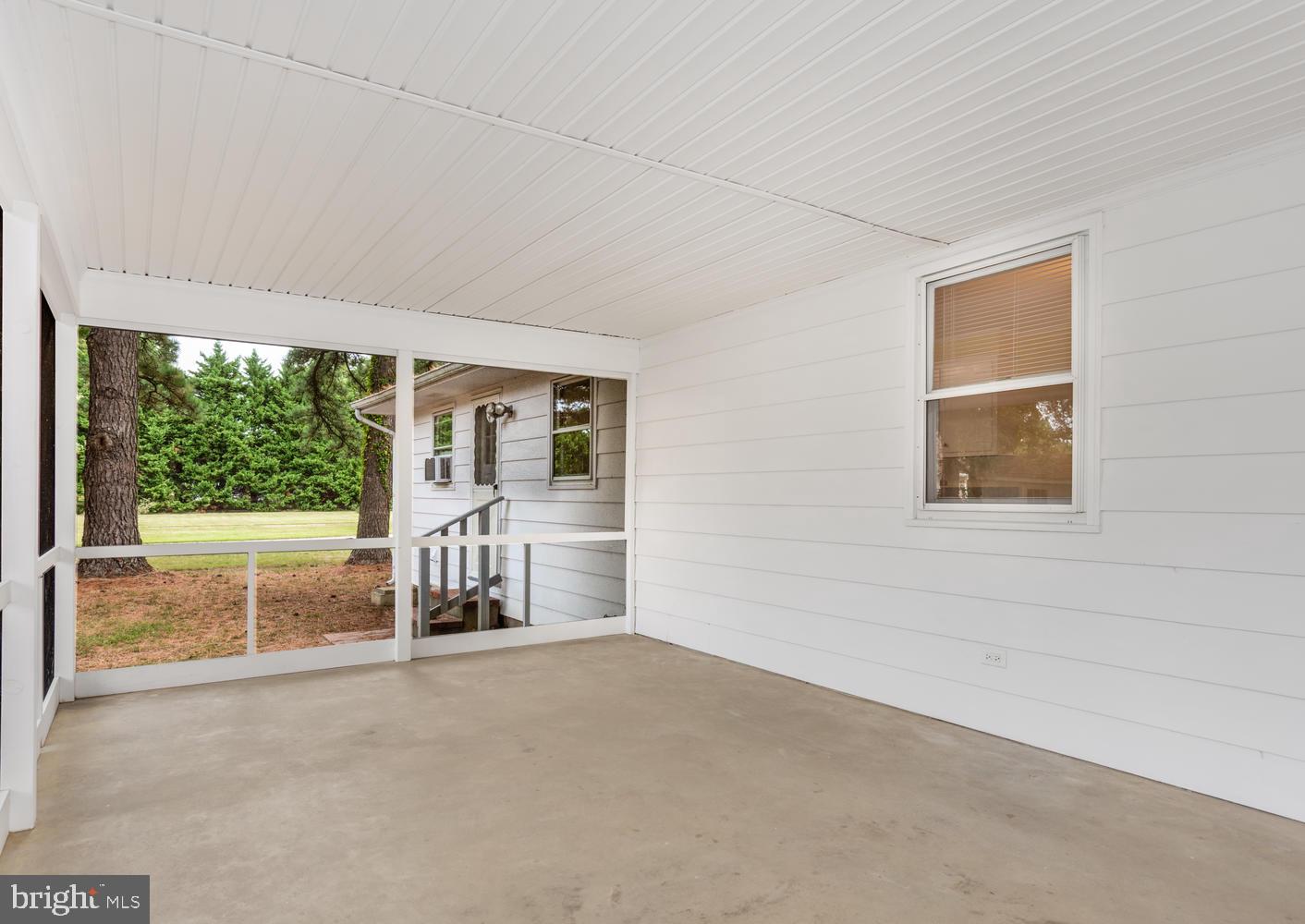 8166 Bozman Neavitt Road St. Michaels, MD 21663 - Photo 22 of 33 Screen Porch